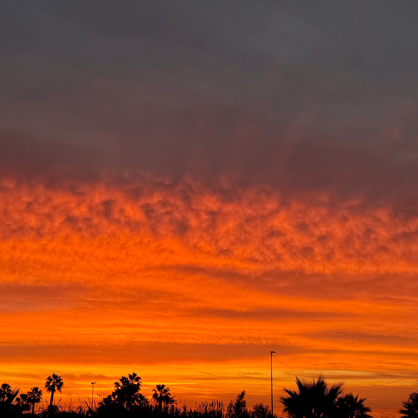 Sonnenuntergang am Strand bei Málaga